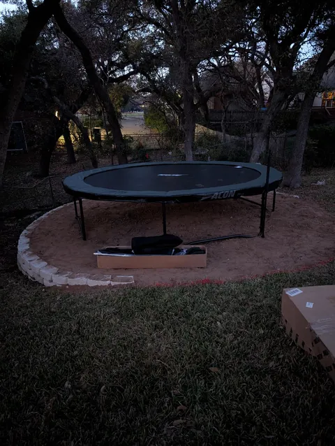 Bought a trampoline for the kids. Then remembered the hill ..