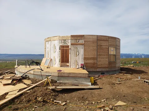 Spent several years building a complete 1300 sq ft roundhouse from top to bottom with my wife, including all framing, electrical, plumbing, HVAC, etc. By far the worst idea we've ever had, and so happy to be in it finally.