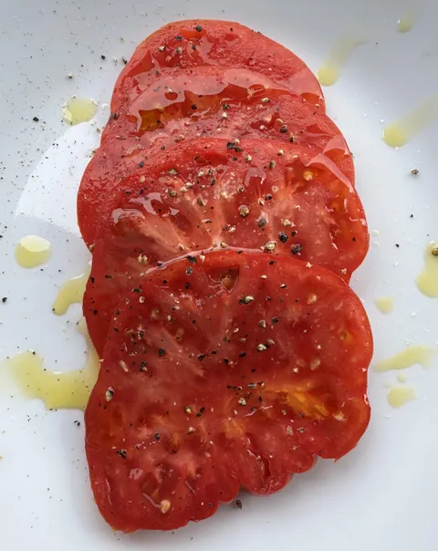 [produce]heirloom tomato, salt, pepper, and EVOO
