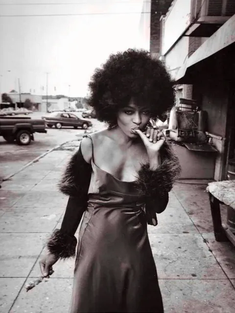 Diana Ross finishing a rib on the street | Bessemer, Alabama | 1997