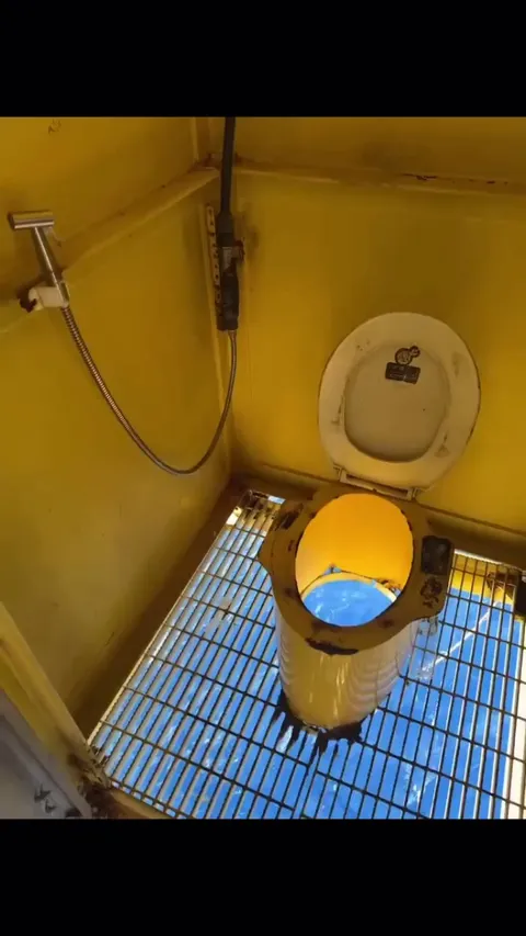 This toilet open to the ocean below