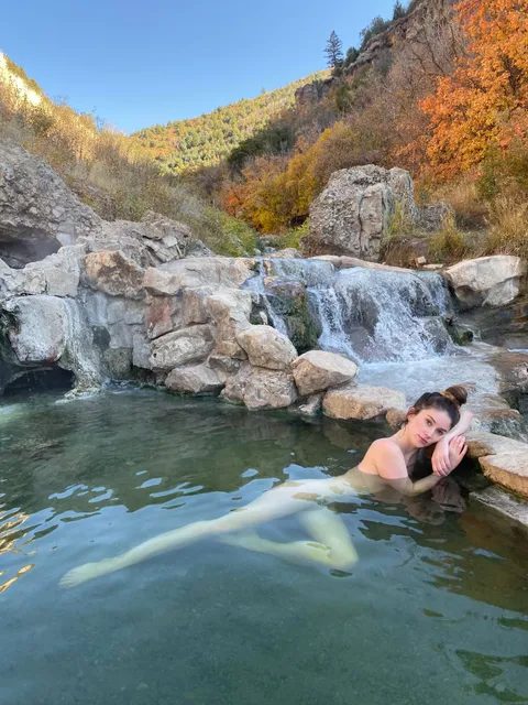 Soaking in a hot spring