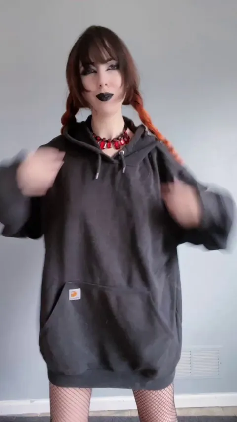 You never know what’s underneath the giant hoodie