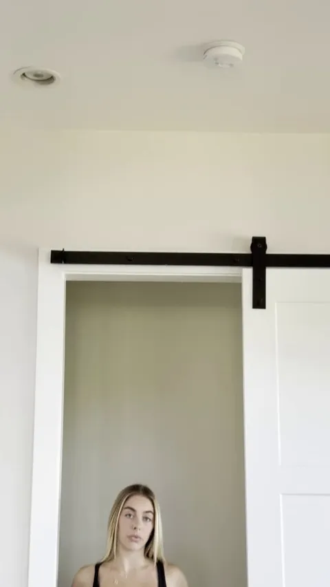 Here’s a playful striptease reveal