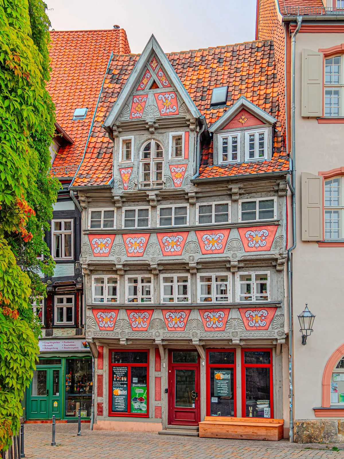 Colorful half-timbered house on Breite Street in the historic town of Quedlinburg north of the Harz mountains, Saxony-Anhalt, Germany.