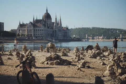 Exposed riverbed in the center of Budapest as the Danube's waterlevel reaches an all time low due to droughts and record heat.