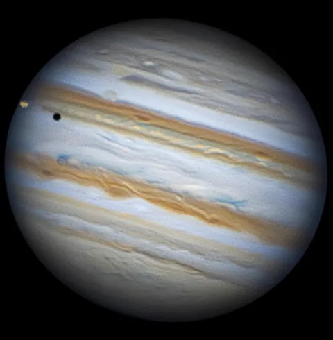 A Solar Eclipse on Another World: Io’s Shadow Crossing Jupiter Yesterday Through my Telescope.
