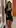 Teasing in black, mirror's reflection says it all