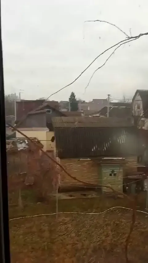 Russian plane over Hostomel Ukraine firing on homes