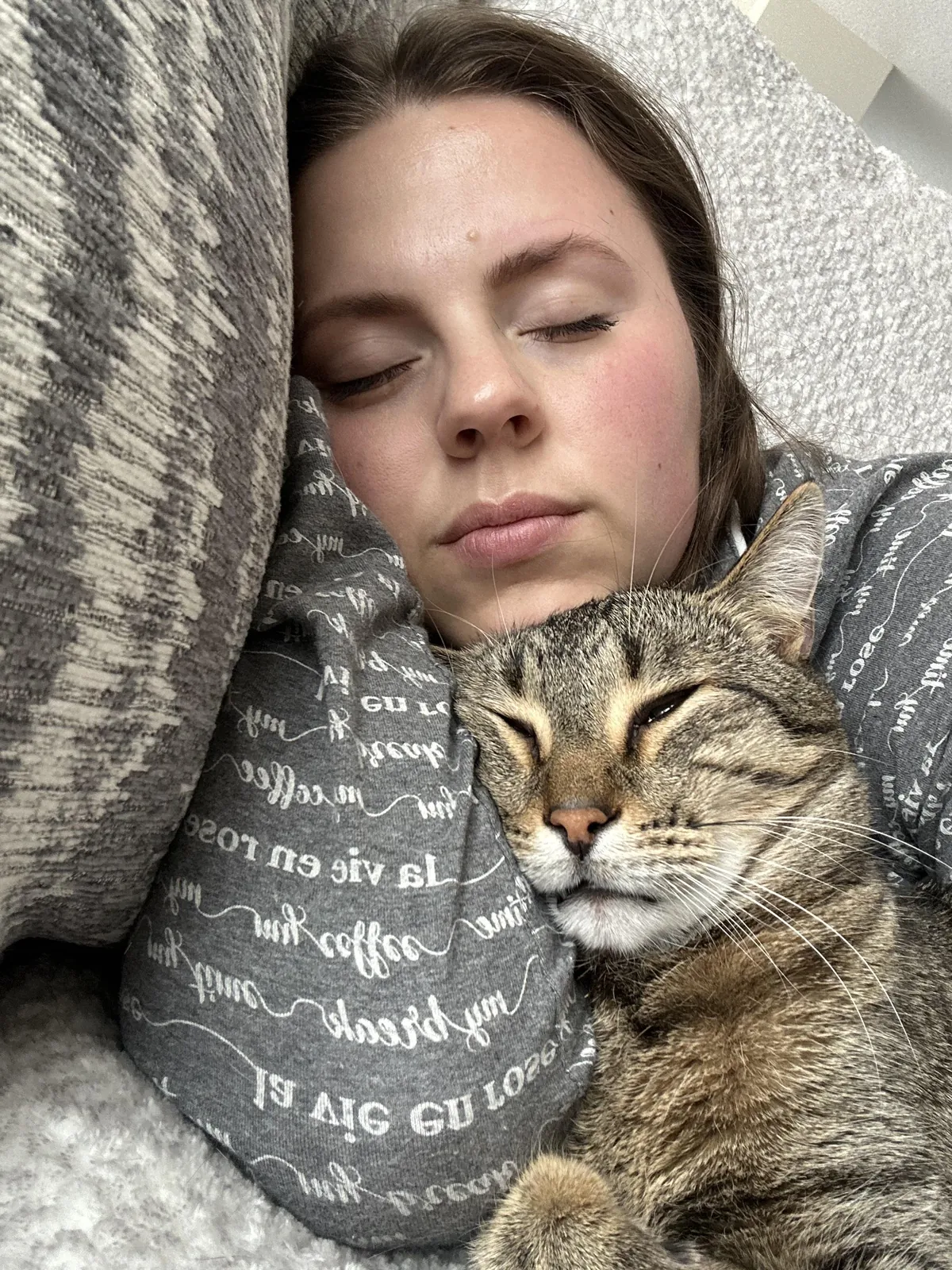 My cat loves taking naps with us .