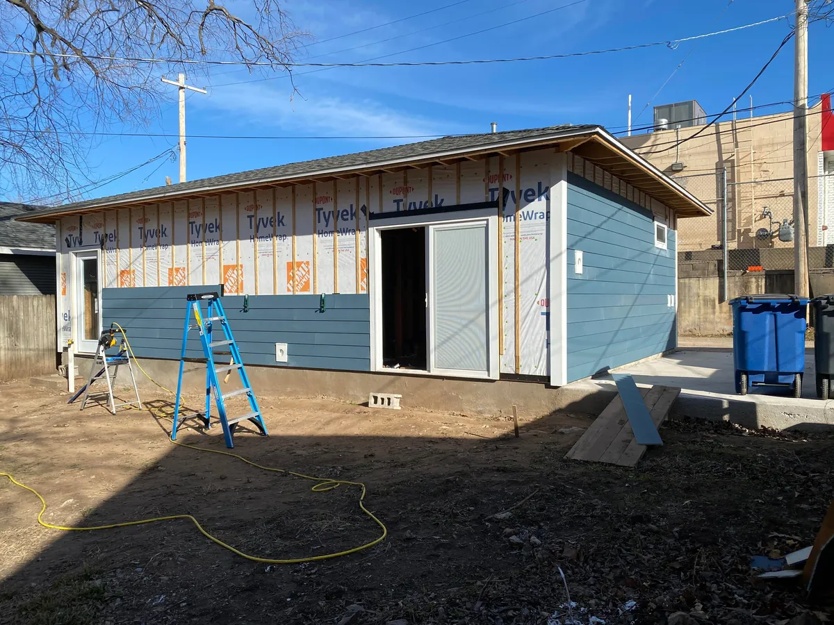 3 year garage/studio apartment build, cost ~$70,000 and one marriage