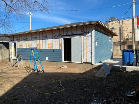 3 year garage/studio apartment build, cost ~$70,000 and one marriage