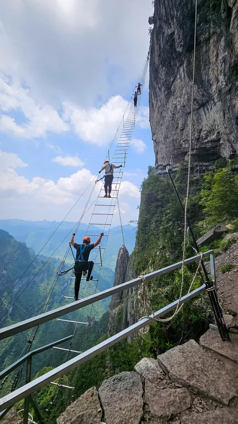 1480 meters big wall Via Ferrata and 168 meters sky ladder climbing challenge in Qixing moutain, Zhangjiajie, China during a solo travel