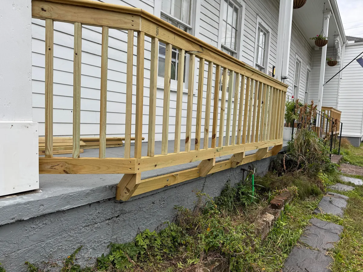 Extended the railing for more front porch space by