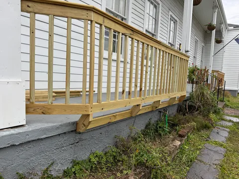 Extended the railing for more front porch space by