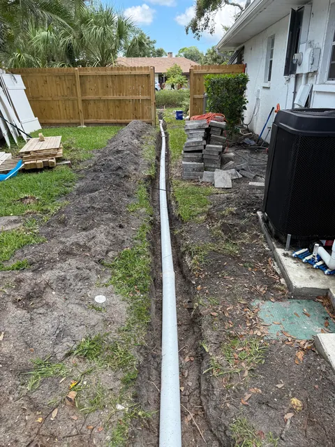 Hurricanes kept flooding my backyard so I buried 140ft of drainage pipe to prevent it.