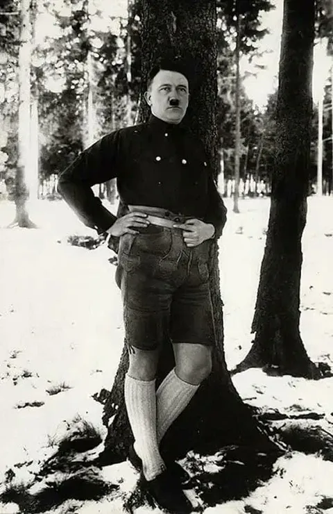 Hitler poses in lederhosen, 1927. He ordered that this photo be hidden from the public.