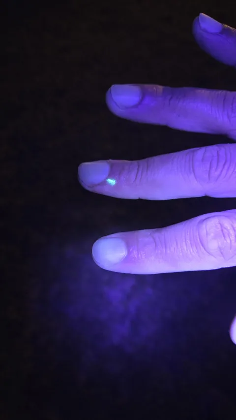Random spot on my finger glows under black light