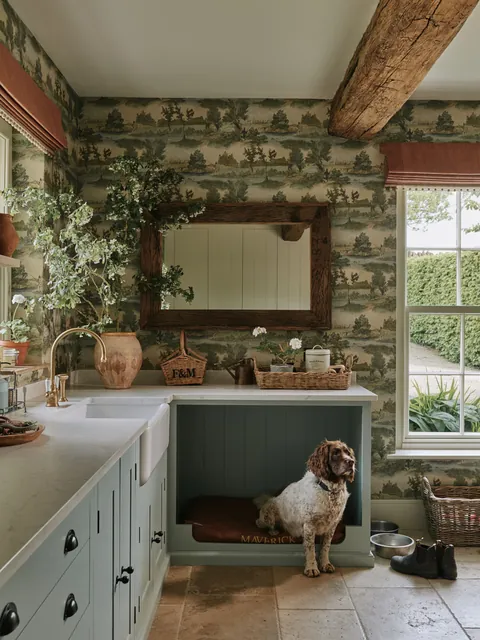 Boot room/utility room with a built-in dog bed in a Warwickshire country house, West Midlands, England [2580x3441]