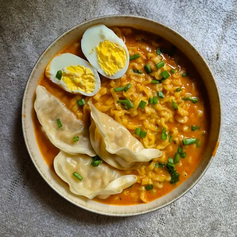 A little throwback: [I ate] Ramen with some dumplings and a hard boiled egg 🍜