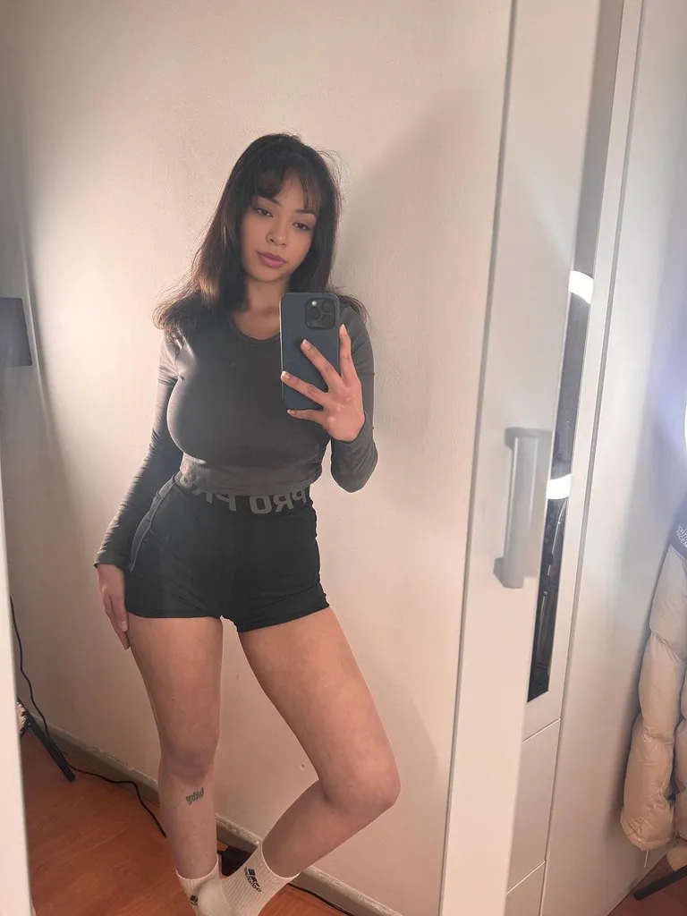 Selfie in a gray shirt.