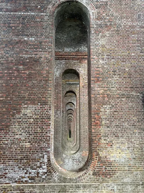The arches of a victorian viaduct. (Chappel viaduct, Essex)