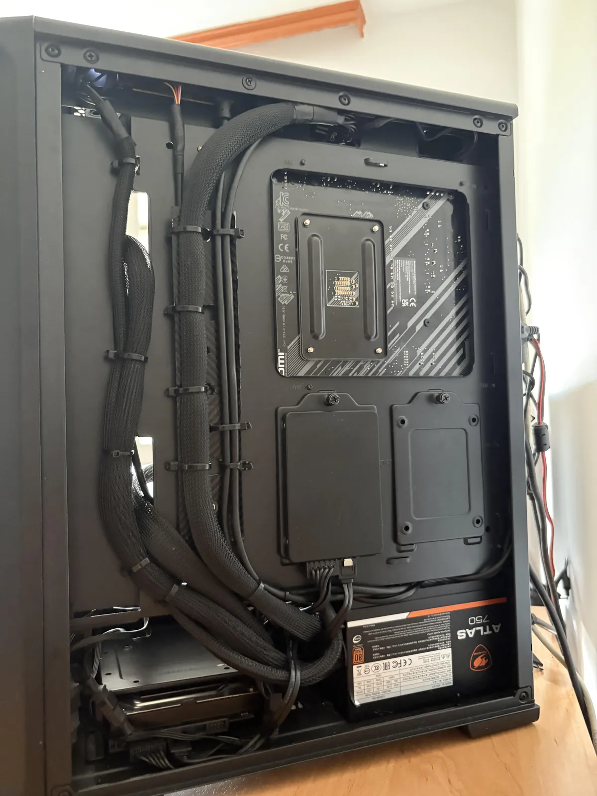 Rate my amateur cable management.