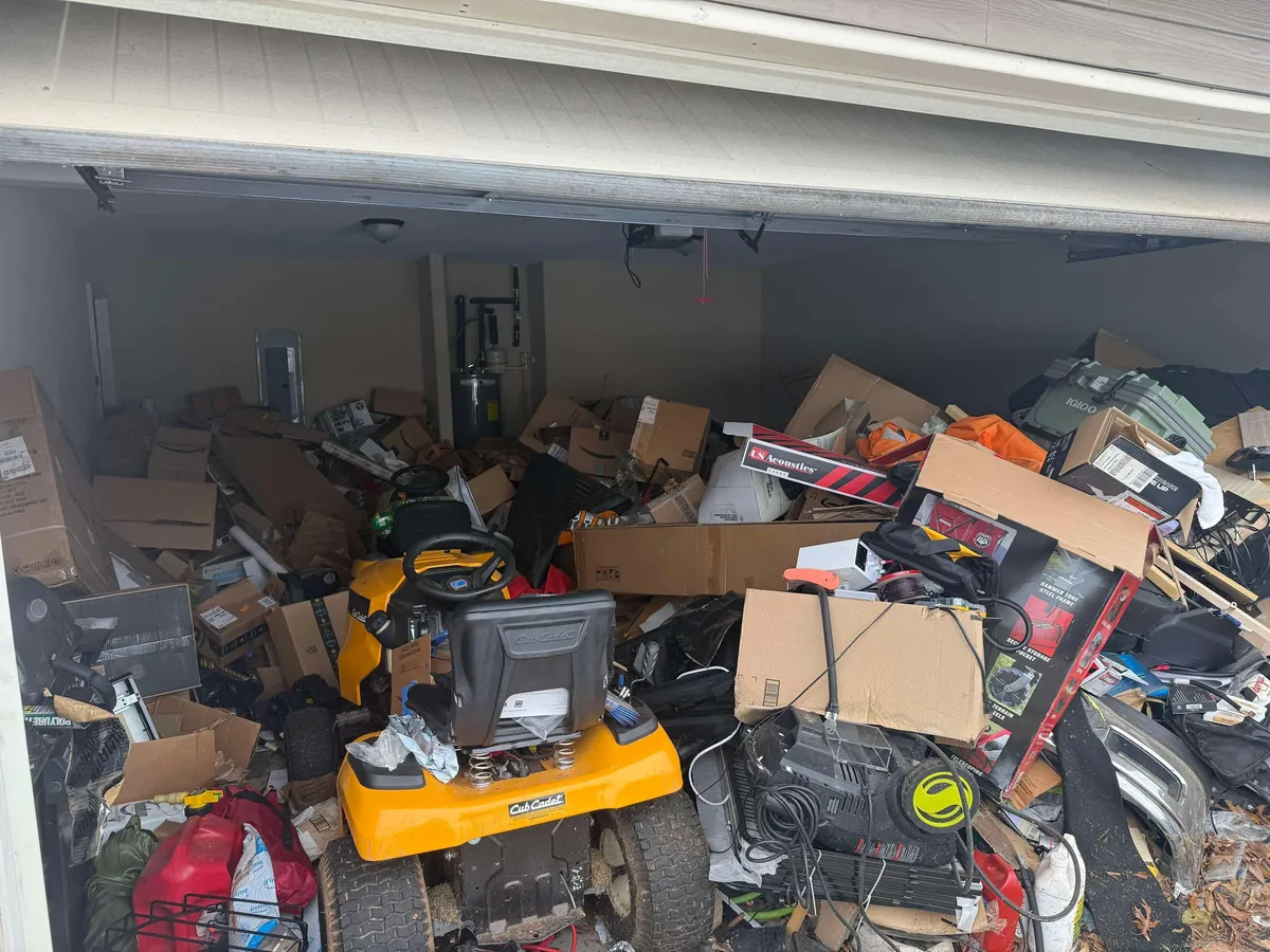 From depression-fueled garbage dump to bat cave and shop. Photos taken 1 month apart.