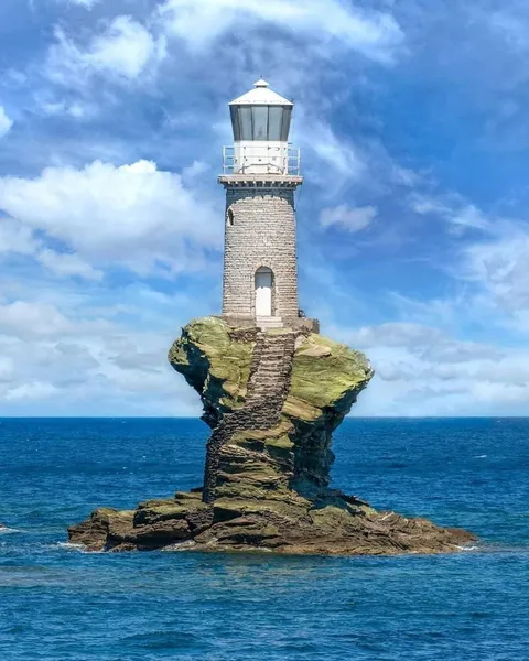 Lighthouse in Andros Island, Cyclades, Greece. Constructed in 1887. (1080x1350)
