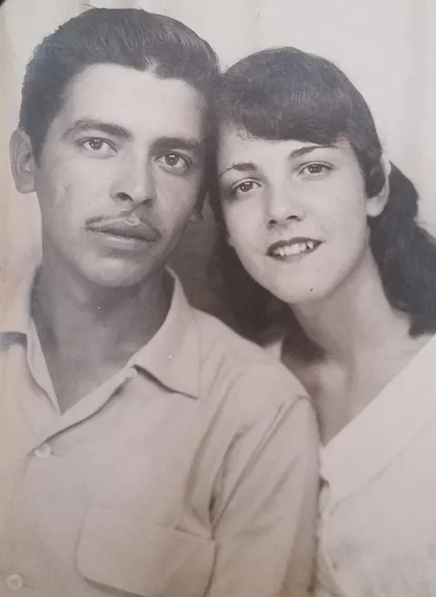 My grandparents, 1958. They were both migrant farmworkers in CA. He didn't know English and she didn't know Spanish but they fell in love anyway.