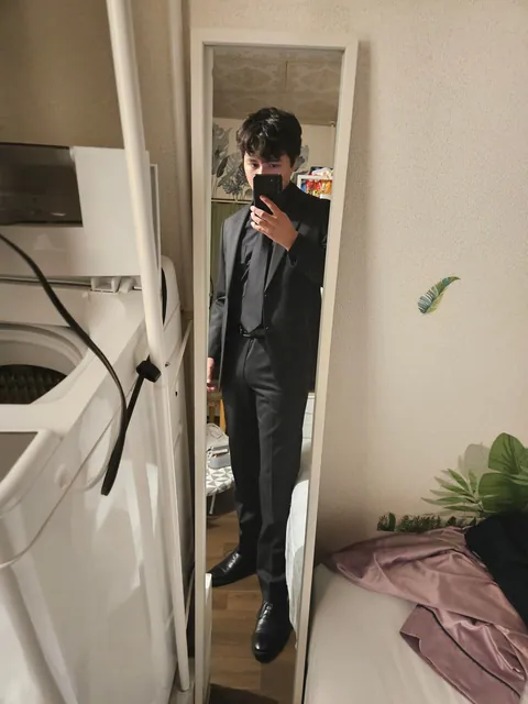 Black suit as a casual outfit