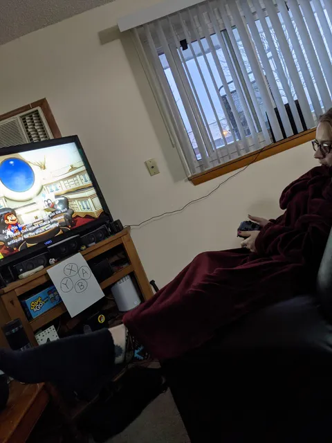 My wife has been learning to play video games recently. To fix a point of frustration, I made her a diagram under the TV so she didn't have to keep looking down at the controller.