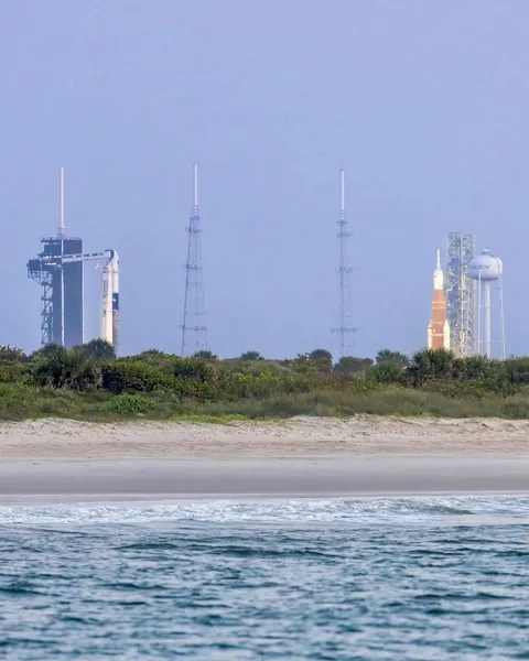 Both the Axiom-1 Falcon 9 and the Artemis-1 Space Launch System at their neighboring launch pads. (photo taken by Erikkuna)