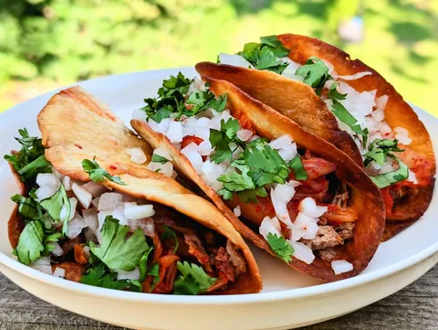 Carne asada tacos with smoked kimchi
