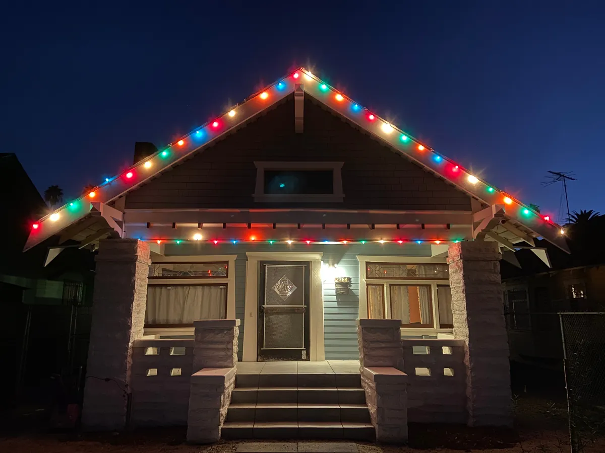 How I hang my Christmas lights with magnets and a long pole