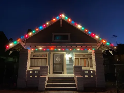 How I hang my Christmas lights with magnets and a long pole
