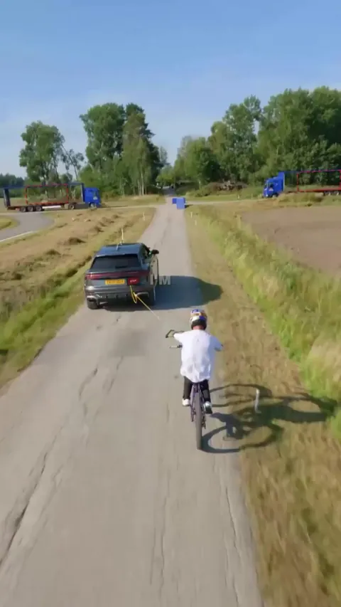 Matt Jones jumping through TWO moving trucks, with less than a ONE second gap