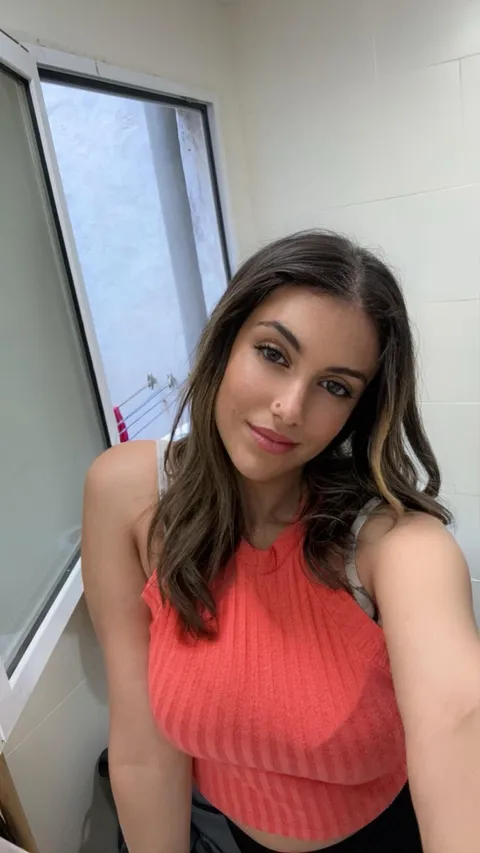 Cutie patootie on her phone, crashing this sub haha