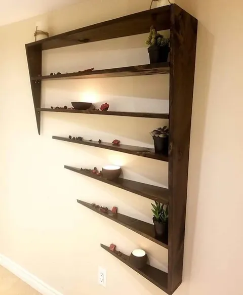 This shelf designed to look like it's glitching through the wall