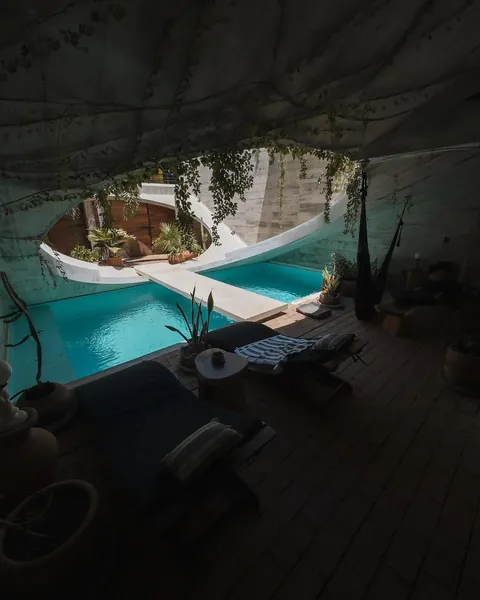 Casa Hezbo by French architect Ludwig Godefroy embraces a bold Brutalist aesthetic while blending indoor-outdoor living in Puerto Escondido.