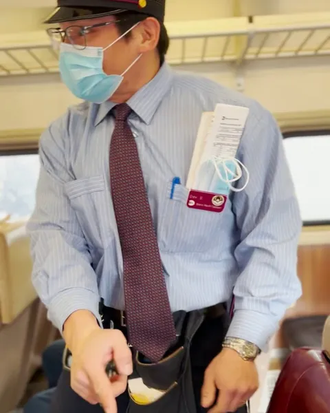 What...? Never seen a jacked train conductor lift 450 lbs. with a corgi on his back?