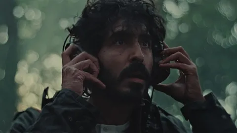First Image of Dev Patel in Horror-Thriller 'Rabbit Trap' - A married couple of musicians move from London to a cottage in Wales to complete their new album. They accidentally record a mystical sound never heard before and gradually disconnect from reality.