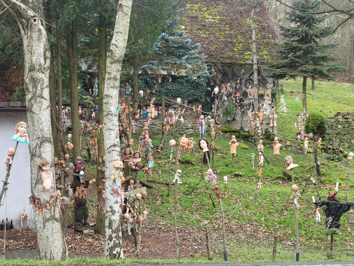 This house near my town. Many years ago it started "only" with hanged babies. Now there are heads on spikes and mannequins too.