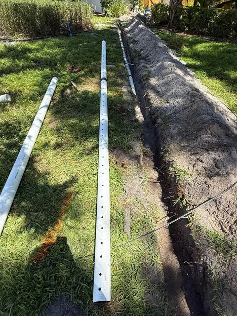 Hurricanes kept flooding my backyard so I buried 140ft of drainage pipe to prevent it.
