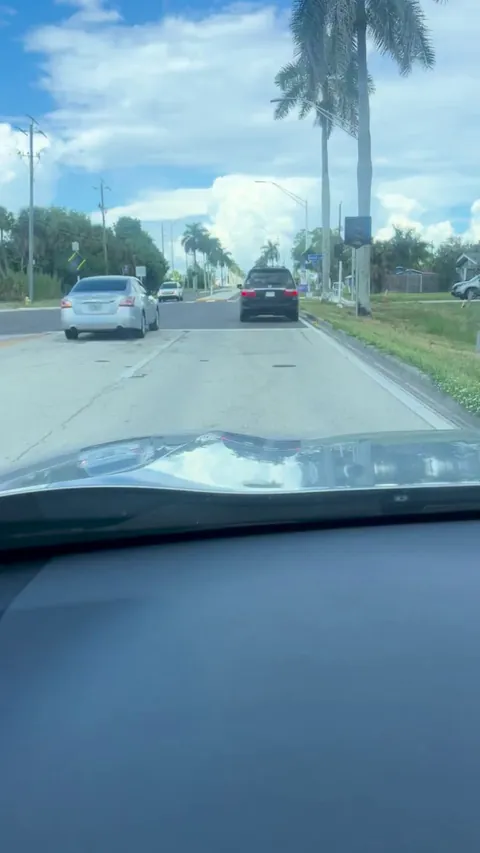 [OC] This driver is deliberately holding up traffic after almost crashing into me while merging.