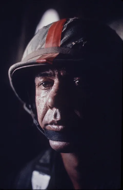 Stare of Korean war veteran (1951) Leon Hostak, just before jumping as a paratrooper in Vietnam (1967)