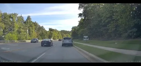 Person almost hits other car then proceeds to hit curb [oc]