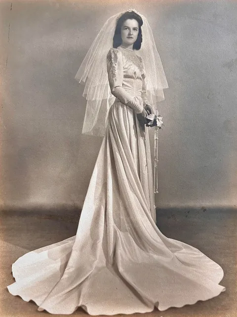 My grandmother in 1942 and my mother in 1982 wearing the same wedding dress on their special day. 