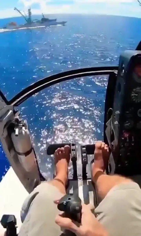 Landing a Helo on a moving fishing vessel.