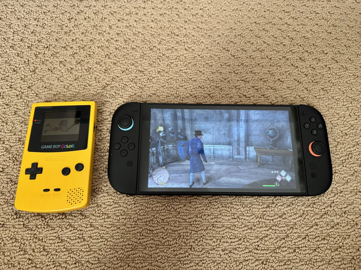 My first handheld next to my most recent. 26 years between the two